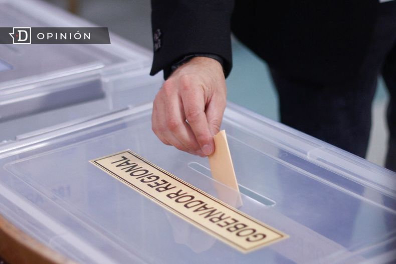 6590 imagen de un voto entrando en una urna de gobernacion region.jpg