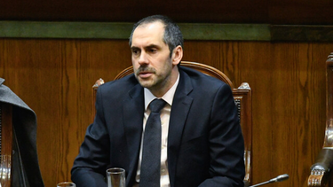 Exministro Nicolas Grau en el hemiciclo de la Cámara de Diputados durante la acusación constitucional en su contra. Créditos: Agencia Uno.&nbsp;