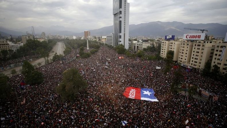 marcha neoliberalismo.jpg