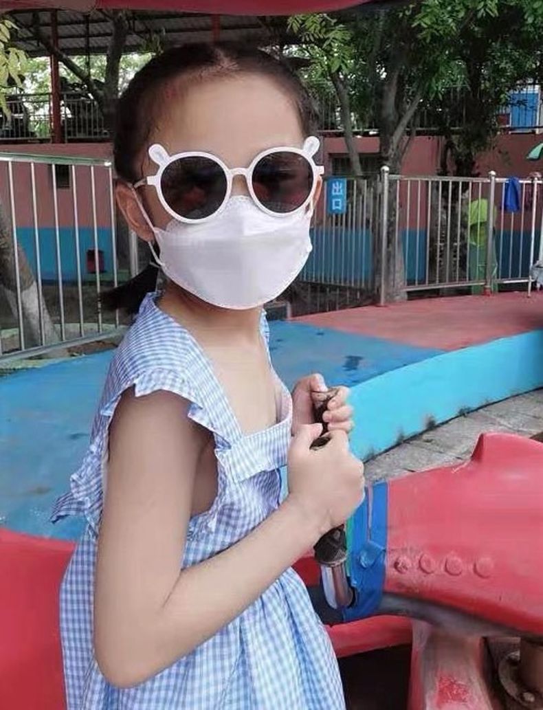 Nina con mascarilla.jpg