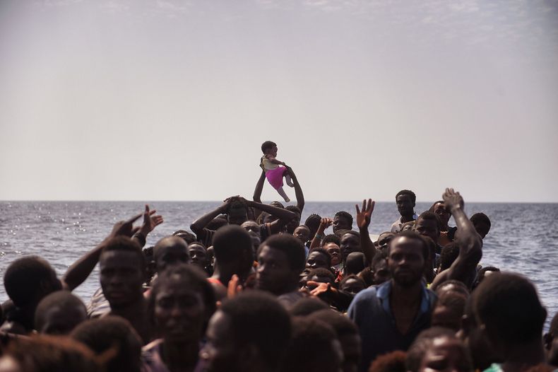 06MIGRANTS slide JVMD superJumbo.jpg