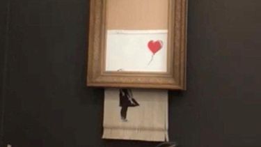 Obra de Bansky se autodestruyó tras ser subastada por más de 1,4 millones de dólares