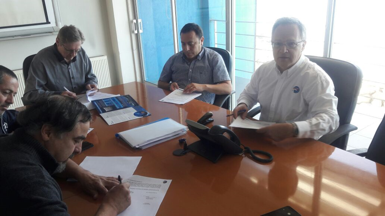 Foto firma negociacion.png