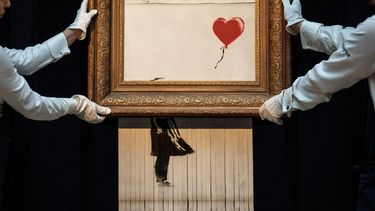Banksy afirmó que su plan original era que su obra Niña con globo” se destruyera completamente