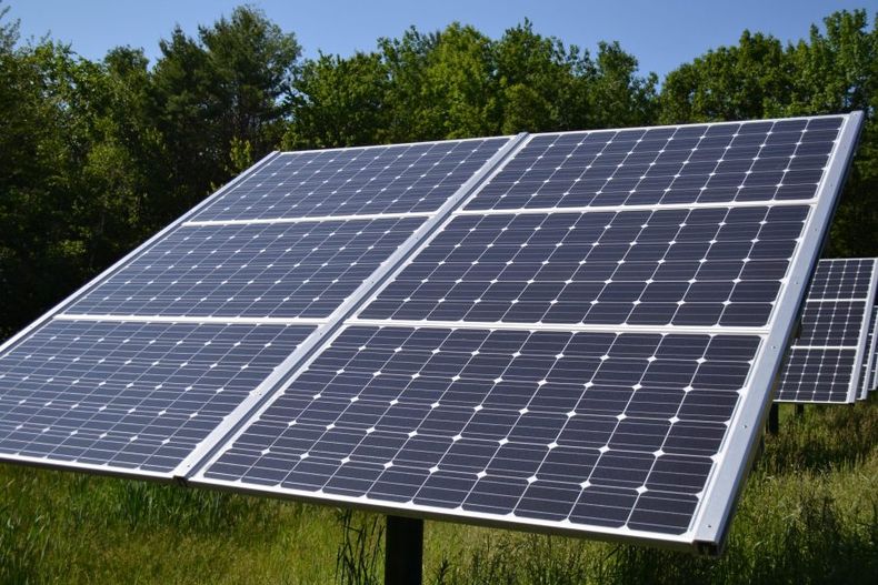 Fixed_Tilt_Solar_panel_at_Canterbury_Municipal_Building_Canterbury_New_Hampshire scaled e1698266778959.jpeg