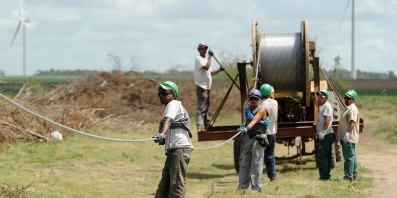 Uruguay windfarm workers_Alamy_C421G8 1440x720 1.jpg